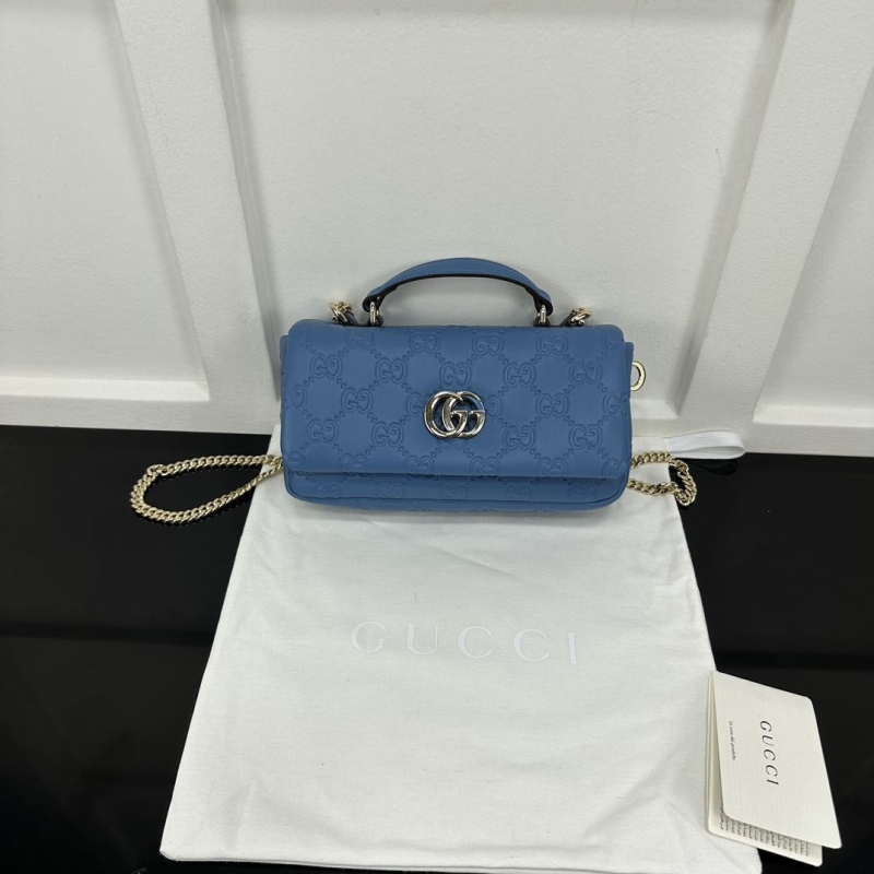 G*u*i top handle bags